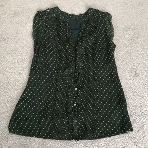 Green and gold polka dot sleeveless blouse